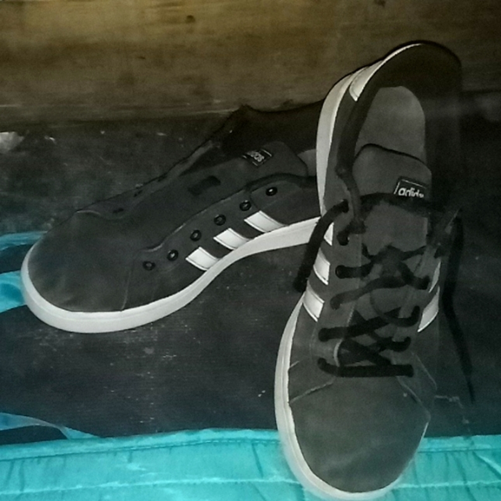 Used in good condition Adidas grand court  black and white.Size 7.Retail $65.
